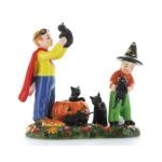 Kids in Costumes with Black Kittens from Santa Claus Christmas Store